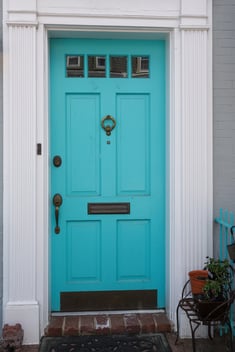 Approaching-the-front-door-of-a-historic-brick-home-Renaissance-Development-DC
