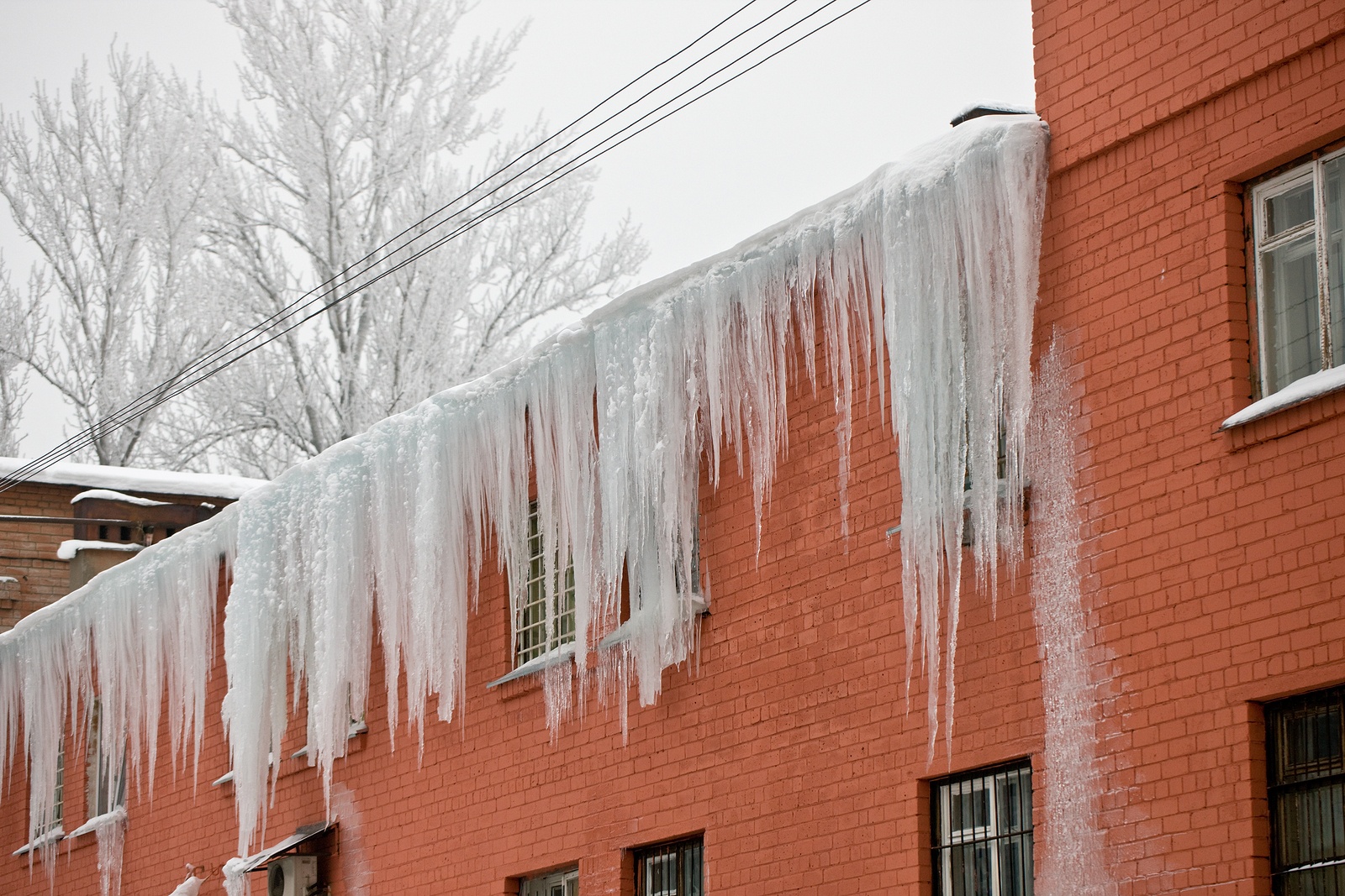 How to Prevent Damage from Ice Dams on Historic Brick Homes